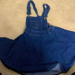 I am selling a dress jumper. It is from KidscooL Space. The size is a 12-13